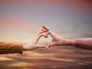 heart shaped hands sunset min